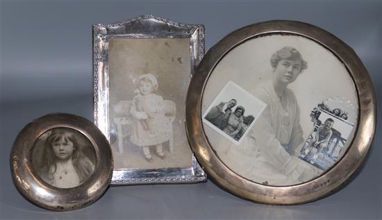 Three silver mounted photograph frames largest 6.75in.
